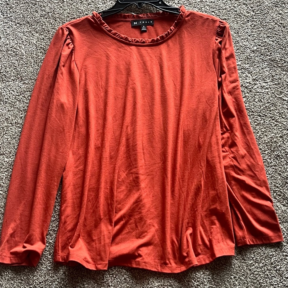 Women's Long-Sleeve Ruffle Neck Top in Rust. Brand new size Small